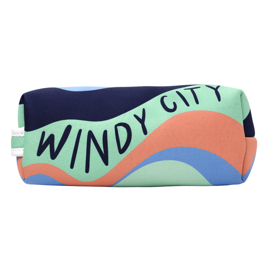 Long side of neoprene pouch: dark blue, light blue, mint, & coral wave pattern and Windy City in dark blue capitals